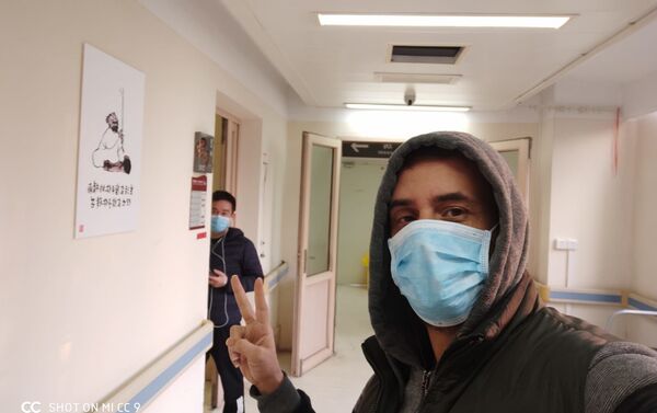 الفلسطيني محمد أبو ناموس، من غزة، يتعافى من فيروس كورونا في الصين - سبوتنيك عربي