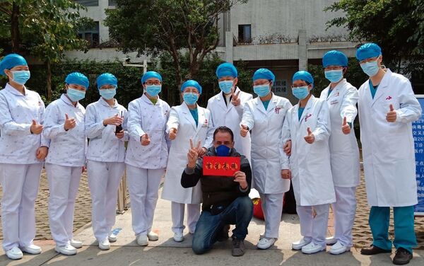 الفلسطيني محمد أبو ناموس، من غزة، يتعافى من فيروس كورونا في الصين - سبوتنيك عربي