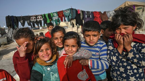 نازحون سوريون في قرية كفر-لوسين في محافظة إدلب، سوريا 10 مارس 2020 - سبوتنيك عربي