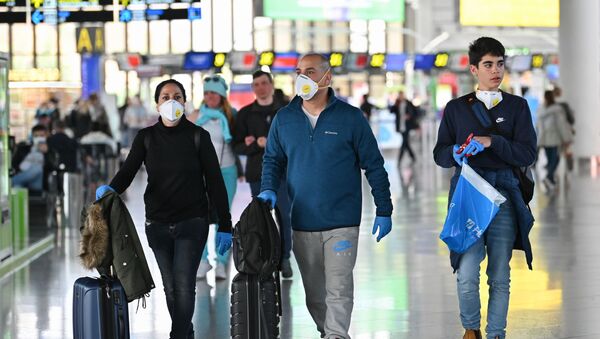 انتشار فيروس كورونا - مسافرون في مطار سوتشي، روسيا  12 مارس 2020 - سبوتنيك عربي