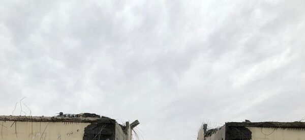 صور دمار إثر قصف بـ33 صاروخا استهدف معسكر للقوات العراقية وبعثة التحالف - سبوتنيك عربي