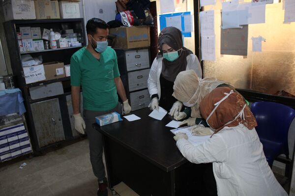 كورونا.. مخاوف استثنائية ضمن مناطق سيطرة تنظيم القاعدة والجيش الأمريكي شمالي سوريا - سبوتنيك عربي