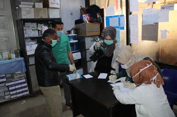 كورونا.. مخاوف استثنائية ضمن مناطق سيطرة تنظيم القاعدة والجيش الأمريكي شمالي سوريا - سبوتنيك عربي