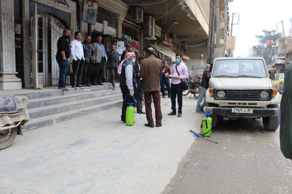 كورونا.. مخاوف استثنائية ضمن مناطق سيطرة تنظيم القاعدة والجيش الأمريكي شمالي سوريا - سبوتنيك عربي