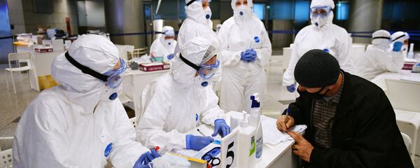 انتشار فيروس كورونا في روسيا - الاجراءات الاحترازية ضد انتشار الفيروس في مطار فنوكوفو، موسكو، روسيا ١٩ مارس ٢٠٢٠ - سبوتنيك عربي