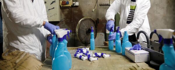 مصنع لانتاج أدوات التعقيم في جنين، تفشي كورونا، الضفة الغربية، فلسطين 12 مارس 2020 - سبوتنيك عربي