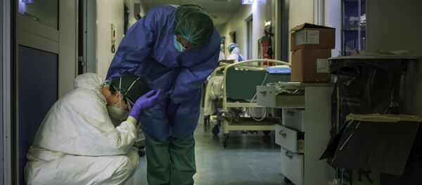 أطباء في مستشفى جنوب شرق ميلانو - كورونا - إيطاليا - سبوتنيك عربي