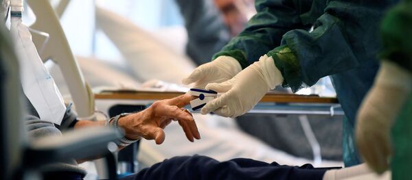 أطباء مستشفى كريمونا، الذين يكافحون مرض Covid-19 إيطاليا مارس 13 مارس 2020، كورونا - سبوتنيك عربي