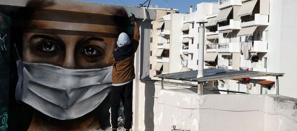 رسم غرافيتي لفنان الجداريات S.F.، أثينا، اليونان 17 مارس 2020 - سبوتنيك عربي