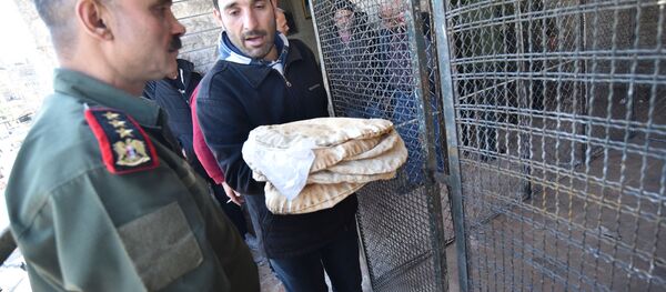 مع أول حالة كورونا...الشرطة السورية تتدخل لتنظيم الازدحام الشديد على أفران الخبز مع أول حالة كورونا...الشرطة السورية تتدخل لتنظيم الازدحام الشديد على أفران الخبز - سبوتنيك عربي