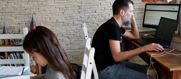 العمل عن بعد، الحجر الصحي، انتشار فيروس كورونا، بودابست ، المجر مارس  2020 - سبوتنيك عربي