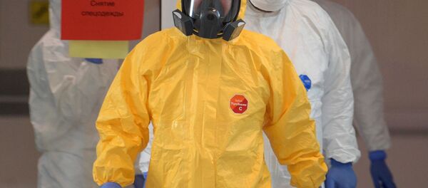 الرئيس فلاديمير بوتين يزور مستشفى كوموناركا، المخصص لاستقبال المصابين بـكورونا، موسكو،  24 مارس 2020 - سبوتنيك عربي