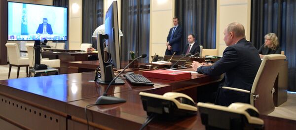   قمة مجموعة العشرين (G20) - الرئيس الروسي فلاديمير بوتين، 26 مارس  2020 - سبوتنيك عربي