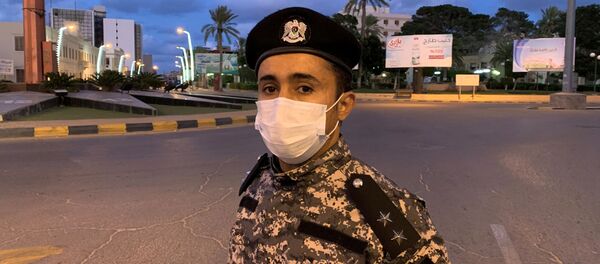 جندي ليبي يرتدي قناعا طبيا للحماية من كورونا - سبوتنيك عربي