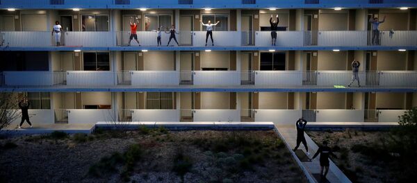 الرياضة عن بعد، في ظل انتشار فيروس كورونا في فرنسا، مارس 2020 - سبوتنيك عربي