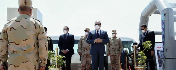 الرئيس المصري عبد الفتاح السيسي يرتدي كمامة وإلى جواره رئيس الوزراء مصطفى مدبولي - مصر - كورونا الرئيس المصري عبد الفتاح السيسي يرتدي كمامة وإلى جواره رئيس الوزراء مصطفى مدبولي - مصر - كورونا - سبوتنيك عربي