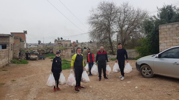 مشغل خياطة يوزع الكمامات على سكان إحدى المدن السورية مجانا... صور وفيديو - سبوتنيك عربي