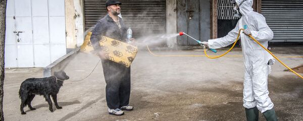 التعقيم و التطهير في إطار الإجراءات الوقائية ضد كورونا في المغرب، أبريل 2020 - سبوتنيك عربي