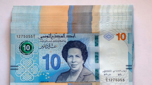 أوراق نقدية فئة 10 دنانير جديدة تحمل صورة أول طبيبة في البلاد توحيدة بن شيخ في تونس أوراق نقدية فئة 10 دنانير جديدة تحمل صورة أول طبيبة في البلاد توحيدة بن شيخ في تونس - سبوتنيك عربي