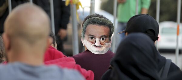 احتجاجات ضد حاكم مصرف لبنان في بيروت - سبوتنيك عربي