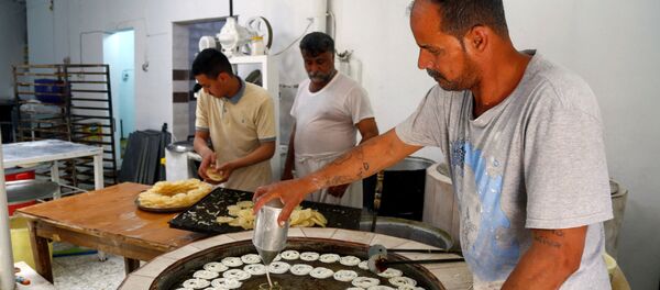 تحضير الحلويات في النجف، شهر رمضان، العراق 25 أبريل 2020 - سبوتنيك عربي