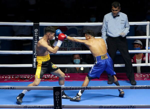 تعايشا مع الفيروس... الحياة الرياضية تعود من جديد من خلال بطولة للملاكمة.. صور - سبوتنيك عربي