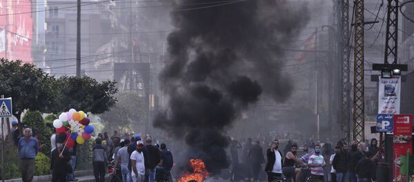 احتجاجات مناهضة للحكومة للبنانية وأعمال شغب في مدينة طرابلس، لبنان 28 أبريل 2020 احتجاجات مناهضة للحكومة للبنانية وأعمال شغب في مدينة طرابلس، لبنان 28 أبريل 2020 - سبوتنيك عربي