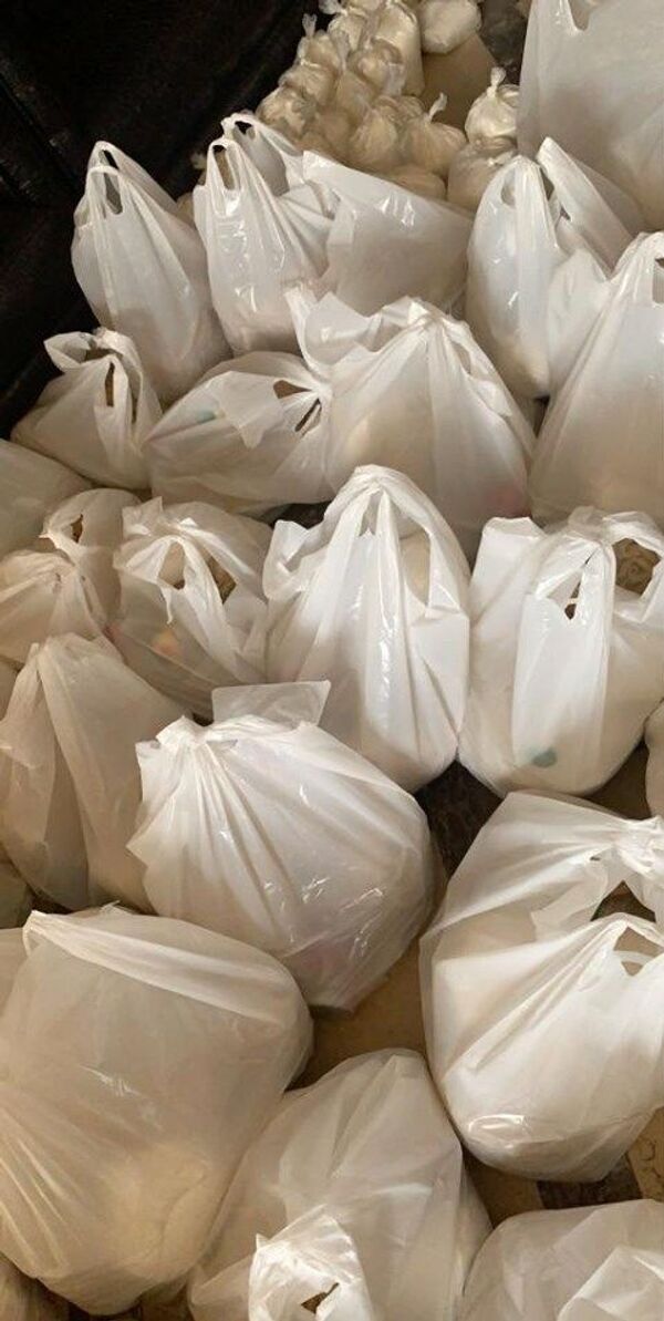 مائدة رمضانية عن بعد.. ليبيات يساعدن مئات الأسر العالقة بالقاهرة... صور - سبوتنيك عربي