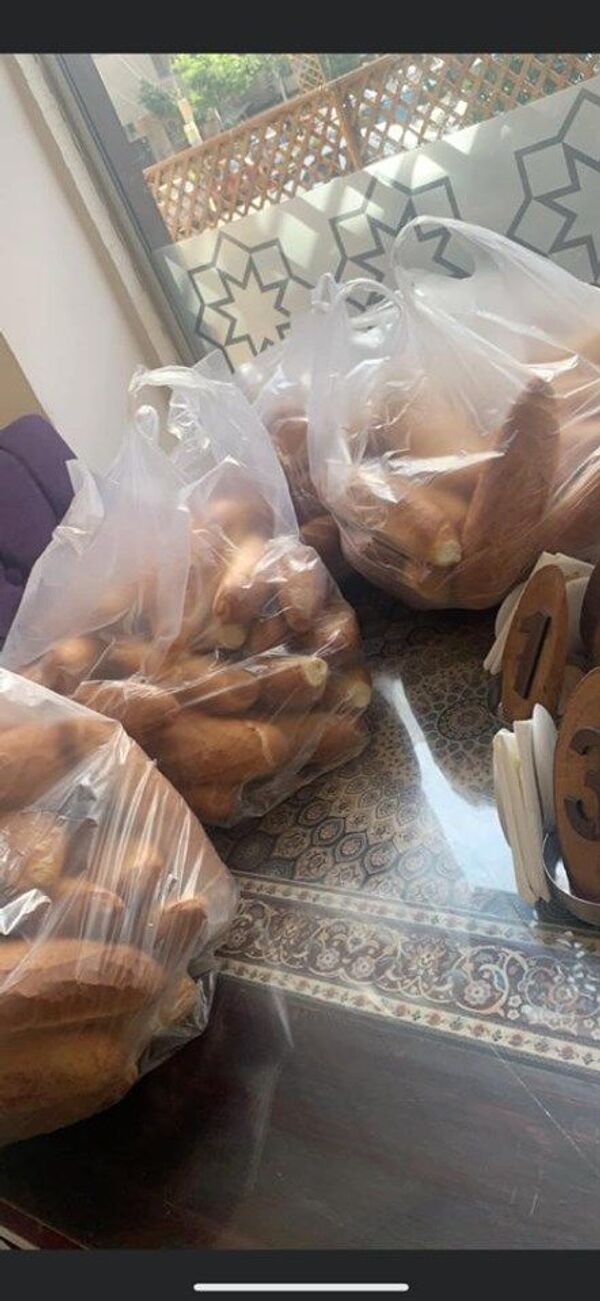 مائدة رمضانية عن بعد.. ليبيات يساعدن مئات الأسر العالقة بالقاهرة... صور - سبوتنيك عربي