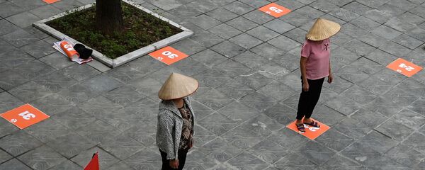 التباعد الاجتماعي بسبب انتشار الفيروس كورونا - هانوي، فيتنام أبريل 2020 التباعد الاجتماعي بسبب انتشار الفيروس كورونا - هانوي، فيتنام أبريل 2020 - سبوتنيك عربي