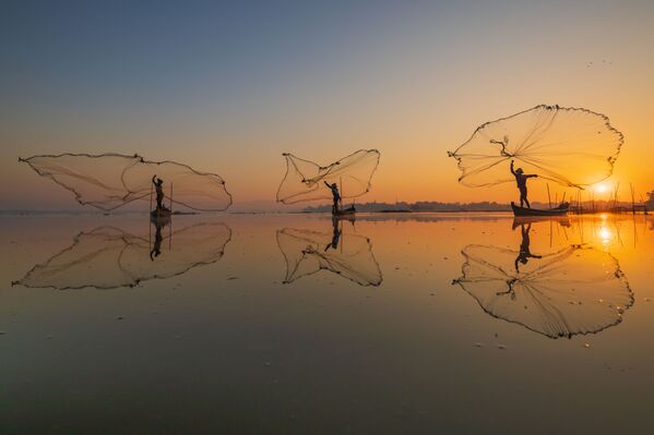 الصورة بعنوان صيد الصباح، للمصور زاي يار لين من ميانمار، الفائز بالمركز الثالث في مسابقة Pink Lady® لأفضل مصور الطعام لعام 2020 - سبوتنيك عربي