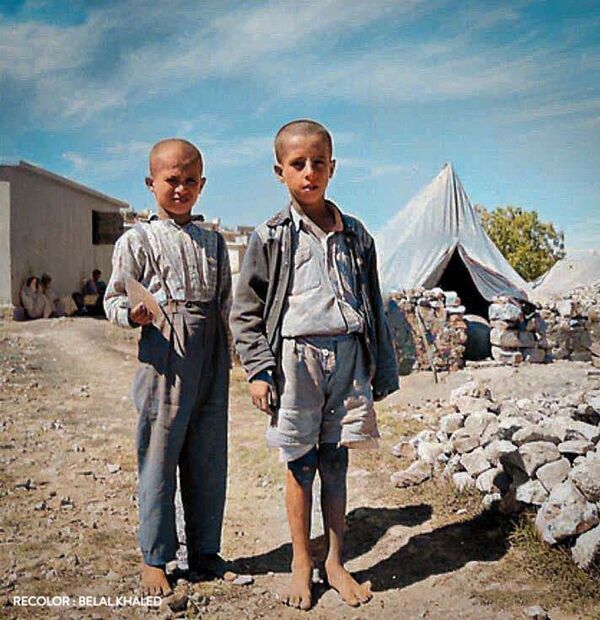 سلسلة من الصور الملونة التي التقطت أثناء أحداث النكبة عام 1948، حيث تظهر المعاناة المؤلمة التي عاشها الأطفال وآباؤهم في تلك المرحلة القاسية من تاريخ فلسطين سلسلة من الصور الملونة التي التقطت أثناء أحداث النكبة عام 1948، حيث تظهر المعاناة المؤلمة التي عاشها الأطفال وآباؤهم في تلك المرحلة القاسية من تاريخ فلسطين - سبوتنيك عربي