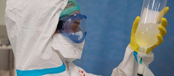 فحص و معالجة مرضى كوفيد-19 (كورونا) في مستشفى بيروغوفا في موسكو، روسيا  18 مايو 2020 - سبوتنيك عربي