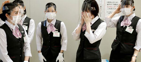 التدابير الصحية والإجراءات الوقائية  ضد تفشي فيروس كورونا في طوكيو، اليابان 18 مايو  2020 - سبوتنيك عربي