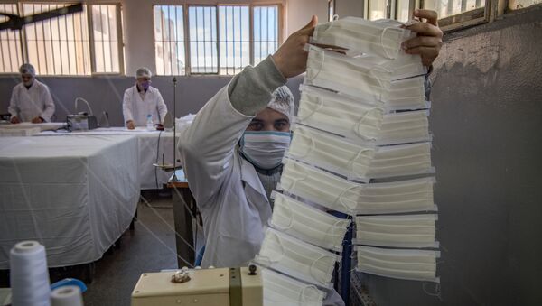 سجناء المغرب يصنعون الكمامات - سبوتنيك عربي