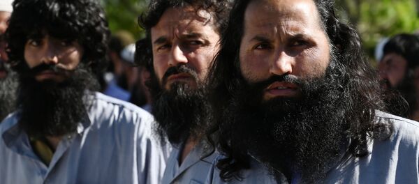 سجناء من حركة طالبان الأفغانية في سجن باغرام، حيث تعزم السلطات الأفغانية إطلاق سراح ما يصل إلى 2000 سجين من طالبان، أفغانستان 26 مايو 2020 - سبوتنيك عربي