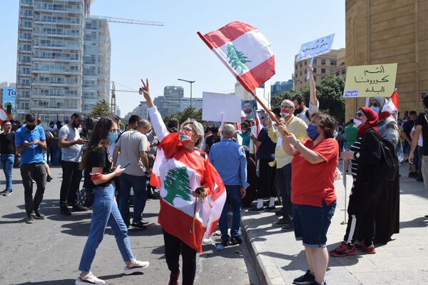 تظاهرة في بيروت للمطالبة بانتخابات نيابية مبكرة.. فيديو وصور - سبوتنيك عربي