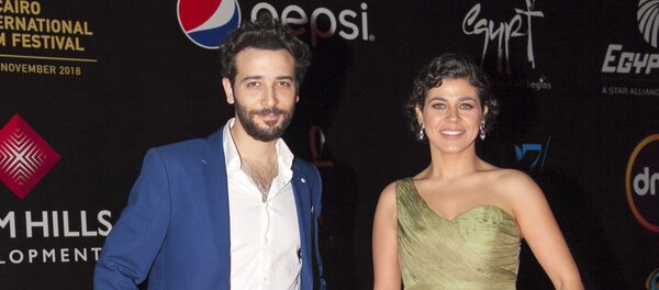 الممثلان المصريان منى هلا وكريم قاسم الممثلان المصريان منى هلا وكريم قاسم - سبوتنيك عربي