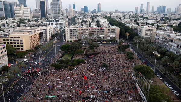 مظاهرات ضد سياسة الاستيطان، ضد خطة بنيامين نتنياهو بضم أجزاء من الضفة الغربية إلى إسرائيل، تل-أبيب  6 يوينيو 2020 - سبوتنيك عربي