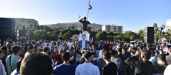 تجمع جماهيري بالعاصمة السورية تنديدا بـقانون قيصر - سبوتنيك عربي