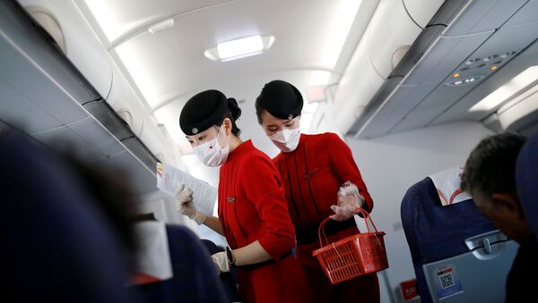 عودة خطوط الطيران الجوية إلى العمل، في إطار تخفيف موجة انتشار كورونا في العالم - شيتشانغ، الصين يونيو 2020 - سبوتنيك عربي