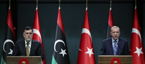 الرئيس التركي رجب طيب أردوغان ورئيس حكومة الوفاق الليبية فايز السراج، 4 يونيو 2020 - سبوتنيك عربي