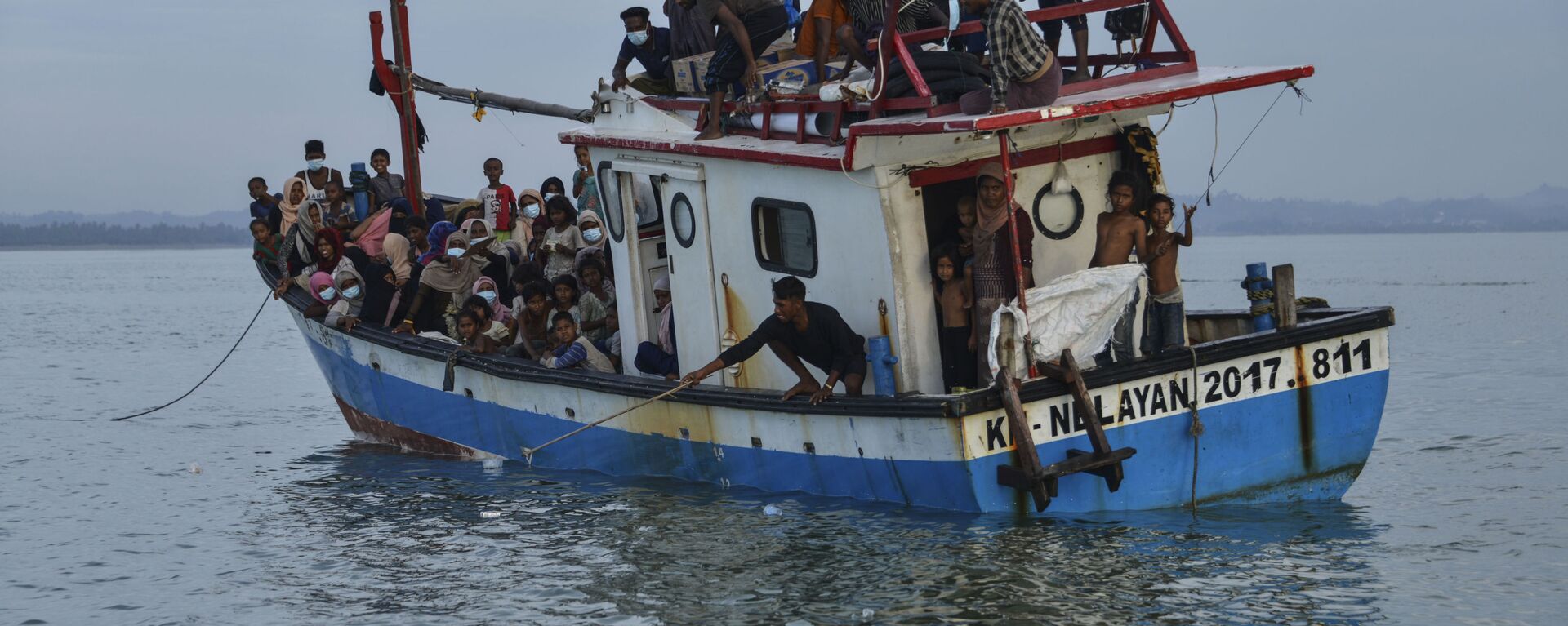 قارب ينقل أشخاص من الروهينغا القادمين من ميانمار، قبالة سواحل إندونيسيا، 25 يونيو 2020 - سبوتنيك عربي, 1920, 25.05.2022