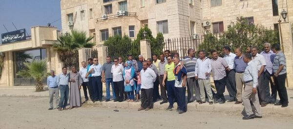 العاملون فيالسورية للحبوب وكهرباء الحسكة يعتصمون ضد قسد - سبوتنيك عربي