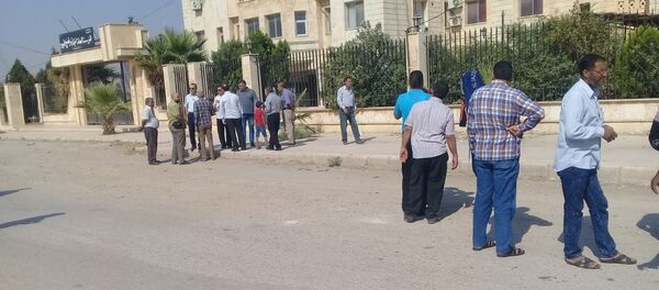 العاملون فيالسورية للحبوب وكهرباء الحسكة يعتصمون ضد قسد - سبوتنيك عربي