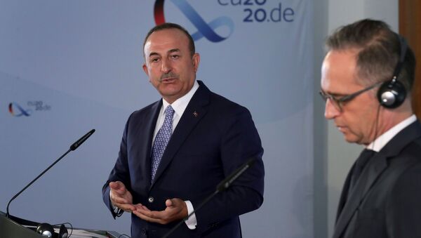 وزير الخارجية التركي مولود تشاووش أوغلو، في مؤتمر صحفي مشترك من نظيره الألماني هايكو ماس في برلين - سبوتنيك عربي
