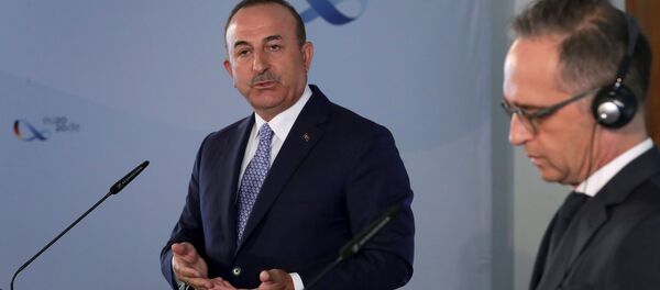 وزير الخارجية التركي مولود تشاووش أوغلو، في مؤتمر صحفي مشترك من نظيره الألماني هايكو ماس في برلين - سبوتنيك عربي