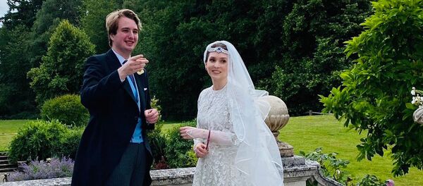 أميرة الأردن راية بنت الحسين وزوجها الصحفي البريطاني نيد دونوفان، 8 يوليو 2020 - سبوتنيك عربي